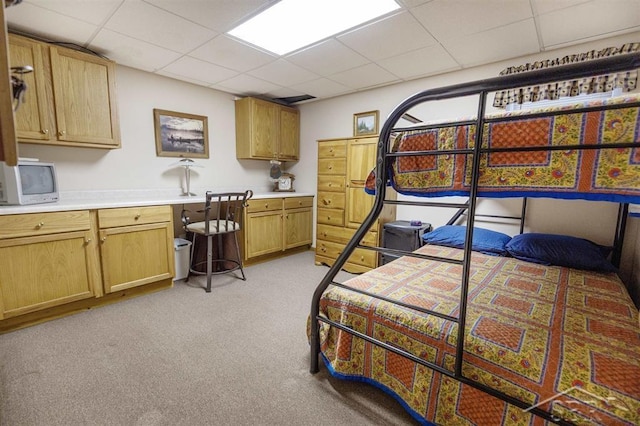 3485 Lakeshore Dr, Lupton, MI 48635 - bedroom with a drop ceiling and light carpet