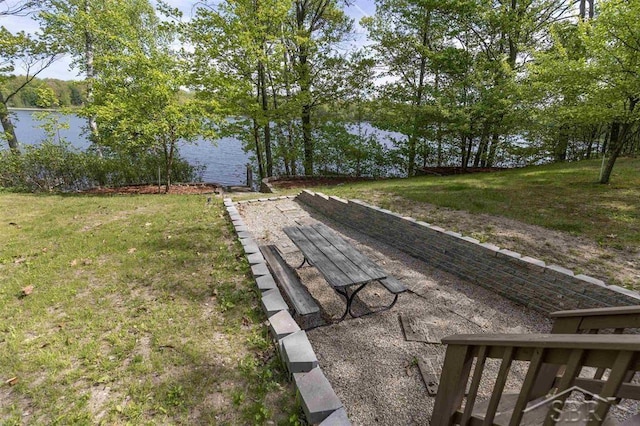 3485 Lakeshore Dr, Lupton, MI 48635 - view of green lawn featuring a water view