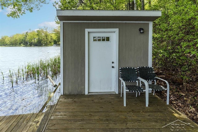 3485 Lakeshore Dr, Lupton, MI 48635 - property entrance with a water view