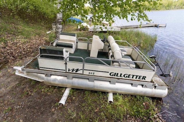 3485 Lakeshore Dr, Lupton, MI 48635 - dock with a water view