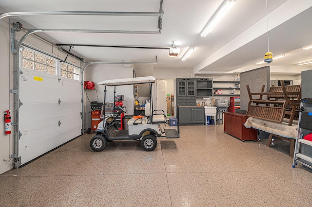 8680 Dexter Pinckney Rd, Pinckney, MI 48169 - garage with a garage door opener