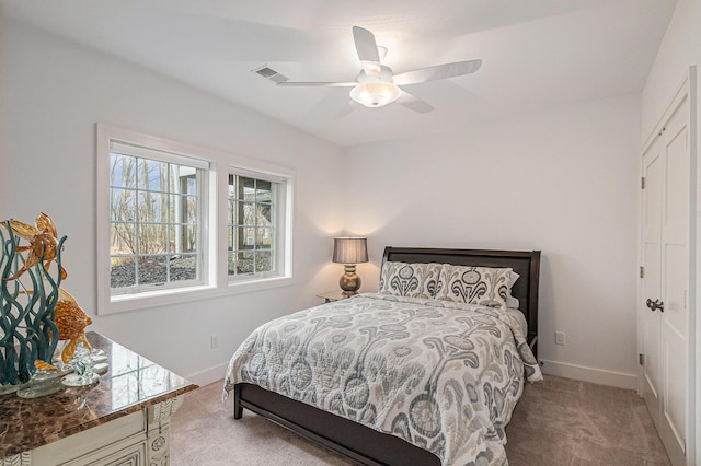 8680 Dexter Pinckney Rd, Pinckney, MI 48169 - carpeted bedroom with baseboards and ceiling fan