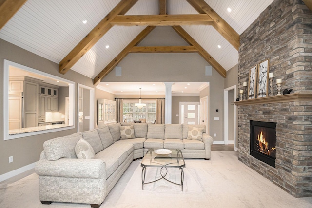 8680 Dexter Pinckney Rd, Pinckney, MI 48169 - living area with decorative columns, baseboards, high vaulted ceiling, a fireplace, and recessed lighting