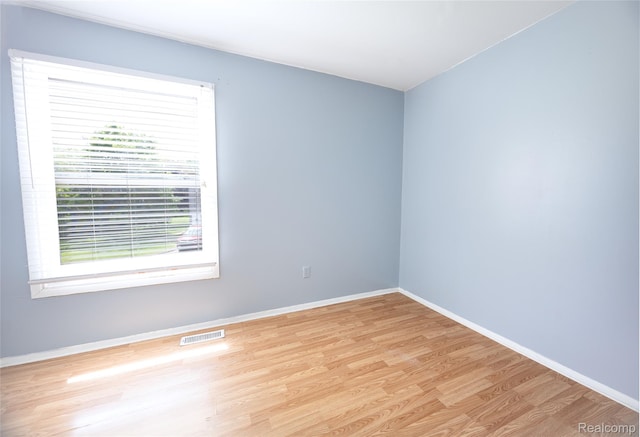 3007 Maplewood Ct, Rochester Hills, MI 48360 - empty room with wood finished floors and baseboards