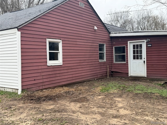 497 River Rd, Otsego, MI 49078 - view of side of home with a shingled roof