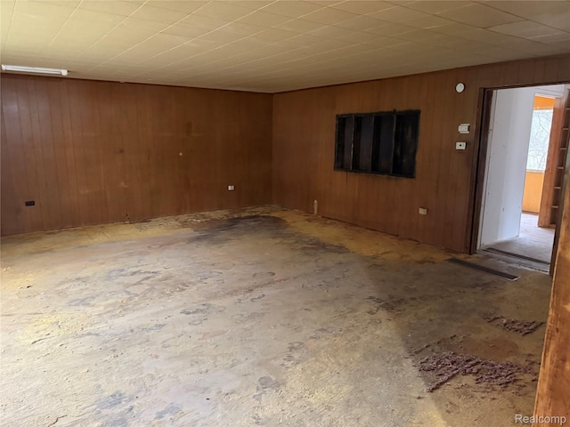 497 River Rd, Otsego, MI 49078 - empty room featuring wooden walls