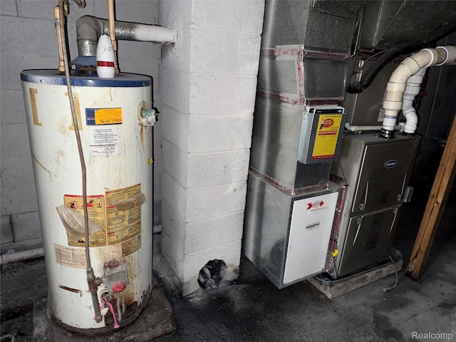 497 River Rd, Otsego, MI 49078 - utility room with water heater and heating unit