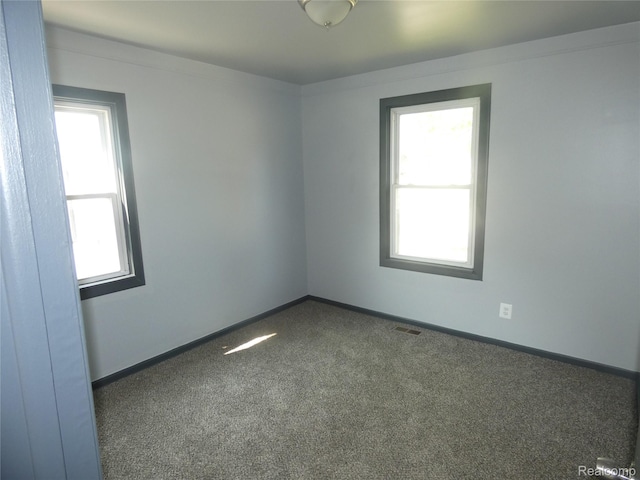21054 Ehlert Ave, Utica, MI 48089 - spare room with carpet flooring and baseboards