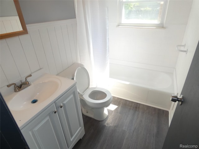 21054 Ehlert Ave, Utica, MI 48089 - bathroom featuring wood finished floors, vanity, toilet, and shower / tub combo with curtain