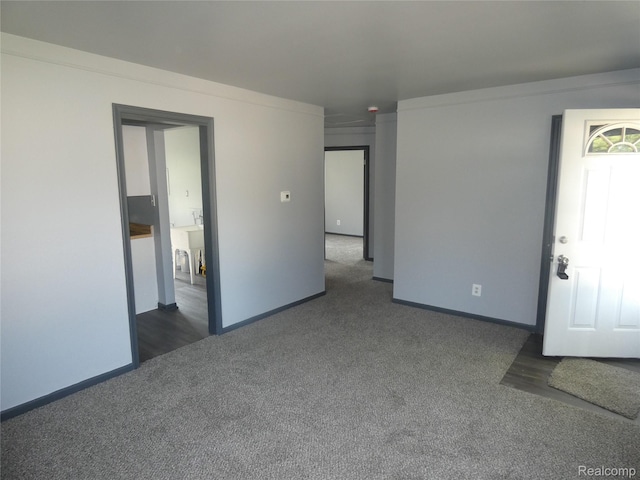 21054 Ehlert Ave, Utica, MI 48089 - spare room with dark carpet and baseboards
