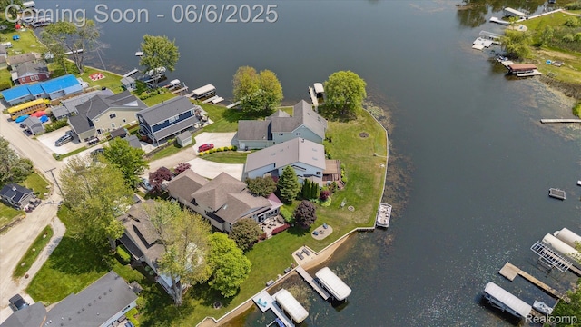4118 Shoreview Ln, Whitmore Lake, MI 48189 - aerial view of property's location featuring a nearby body of water and nearby suburban area