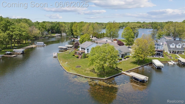 4118 Shoreview Ln, Whitmore Lake, MI 48189 - drone / aerial view of a large body of water and a heavily wooded area