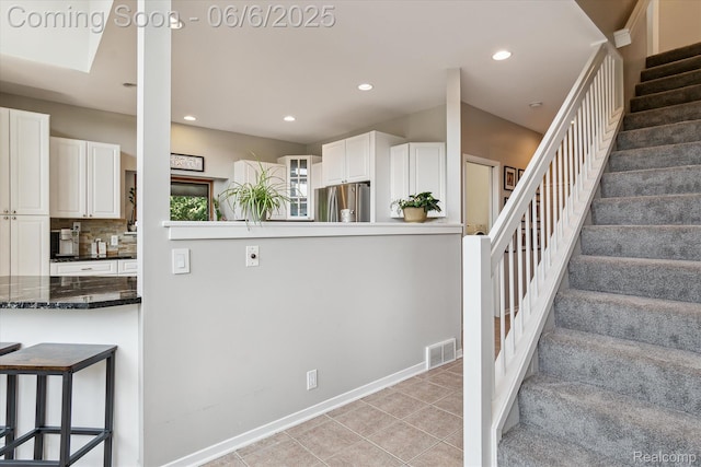 4118 Shoreview Ln, Whitmore Lake, MI 48189 - stairs with recessed lighting, tile patterned flooring, and baseboards