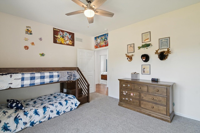 10 Windswept Ln, Hillsdale, MI 49242 - carpeted bedroom with baseboards and a ceiling fan
