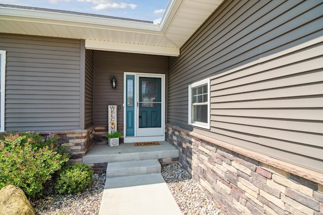 10 Windswept Ln, Hillsdale, MI 49242 - property entrance with stone siding