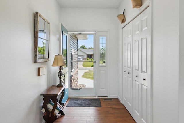 10 Windswept Ln, Hillsdale, MI 49242 - foyer entrance with dark wood-style floors and baseboards