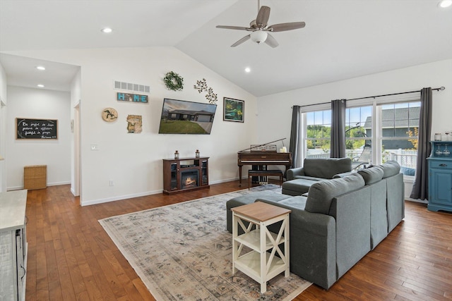 10 Windswept Ln, Hillsdale, MI 49242 - living area featuring a ceiling fan, lofted ceiling, dark wood-style flooring, recessed lighting, and a glass covered fireplace