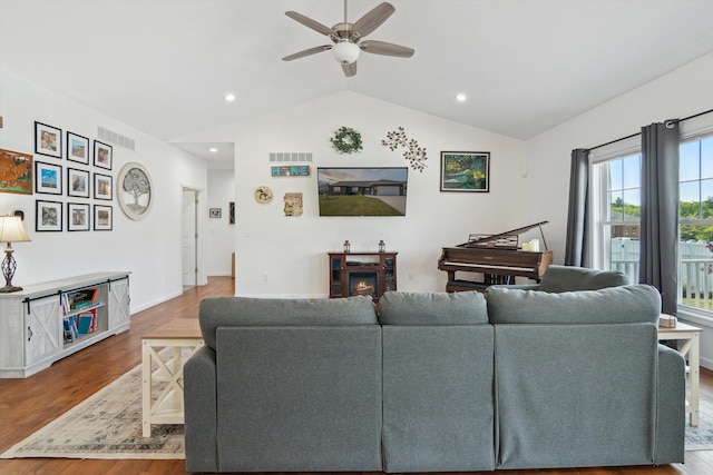 10 Windswept Ln, Hillsdale, MI 49242 - living area featuring lofted ceiling, a ceiling fan, wood finished floors, baseboards, and recessed lighting