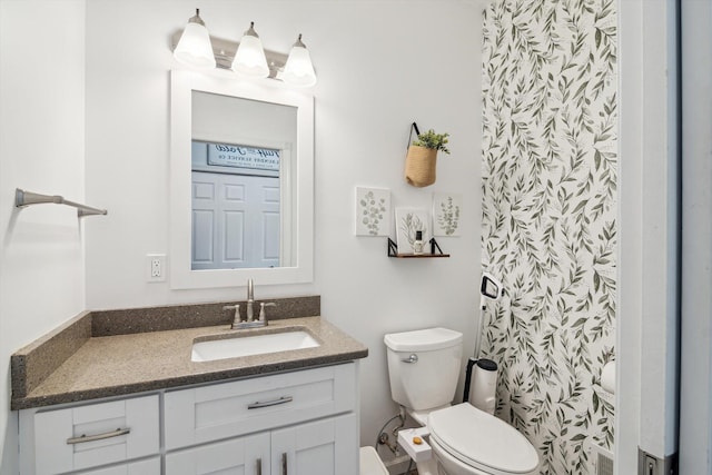 10 Windswept Ln, Hillsdale, MI 49242 - full bath featuring toilet, vanity, and curtained shower