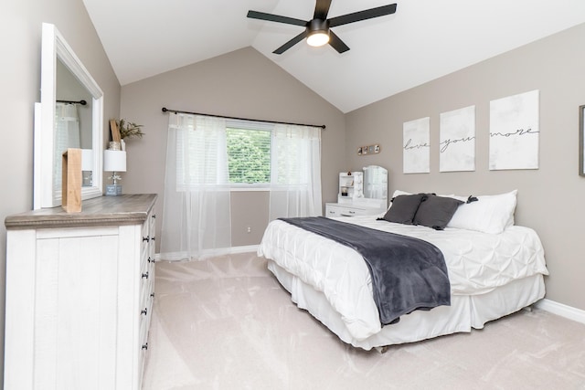 133 E Auburn Trl, Brighton, MI 48114 - bedroom featuring baseboards, light carpet, vaulted ceiling, and ceiling fan