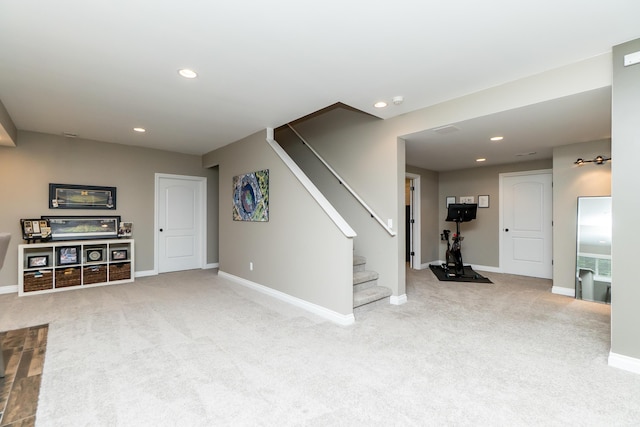 133 E Auburn Trl, Brighton, MI 48114 - unfurnished living room featuring stairway, baseboards, carpet flooring, and recessed lighting