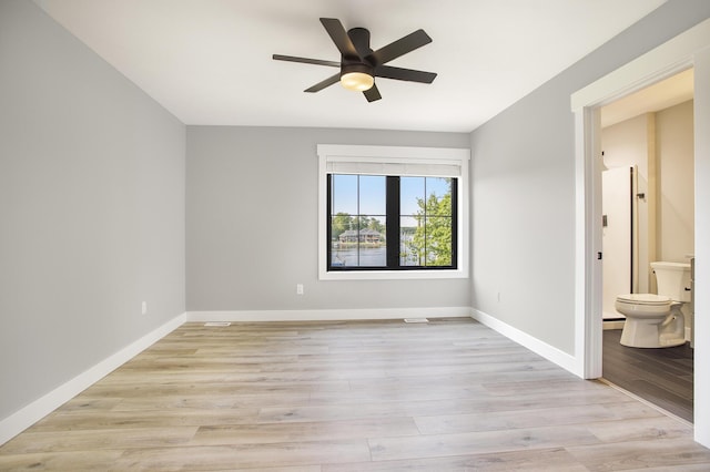 6646 E Eagle Lake Dr, Kalamazoo, MI 49009 - unfurnished room featuring ceiling fan, light wood-style flooring, and baseboards