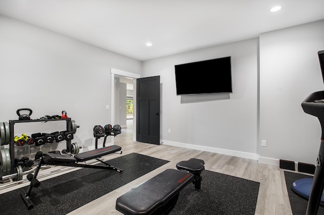 6646 E Eagle Lake Dr, Kalamazoo, MI 49009 - workout room with light wood-style floors, recessed lighting, and baseboards