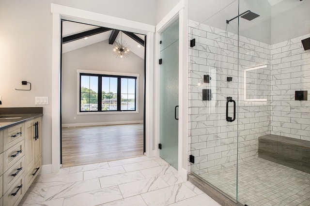 6646 E Eagle Lake Dr, Kalamazoo, MI 49009 - bathroom featuring marble finish flooring, baseboards, a shower stall, and vanity