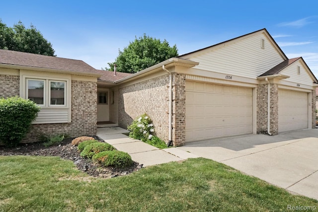 13716 Maple Grove Ave, Shelby Twp, MI 48315 - ranch-style house with an attached garage and brick siding
