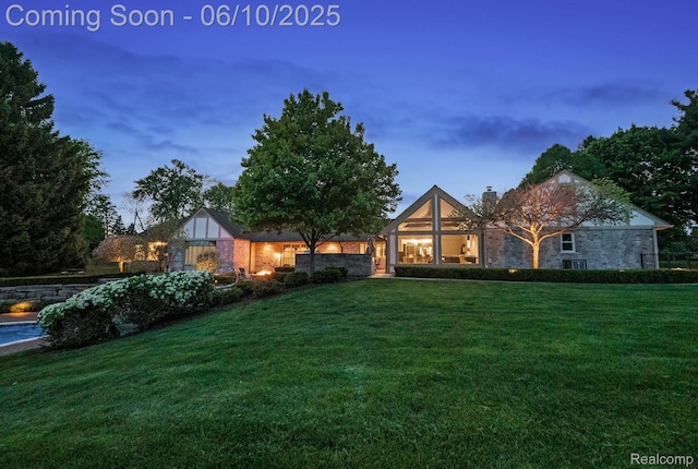530 E Long Lake Rd, Bloomfield Hills, MI 48304 - view of front facade featuring a yard and a chimney
