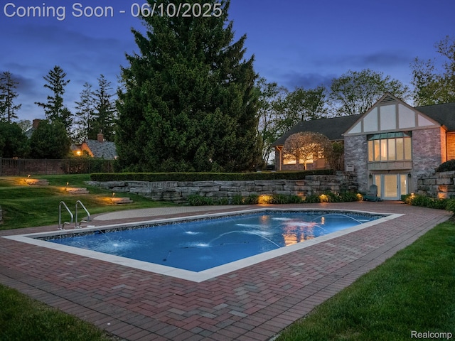 530 E Long Lake Rd, Bloomfield Hills, MI 48304 - pool at dusk featuring a patio area