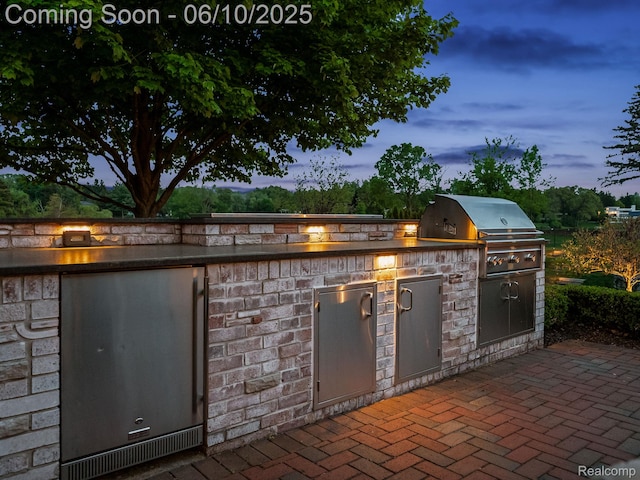 530 E Long Lake Rd, Bloomfield Hills, MI 48304 - patio terrace at dusk with a patio