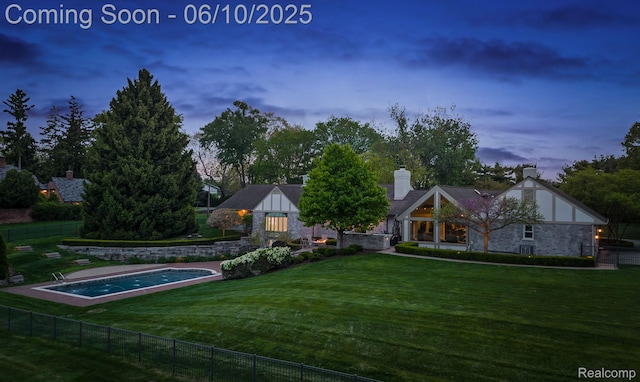 530 E Long Lake Rd, Bloomfield Hills, MI 48304 - rear view of property with a chimney