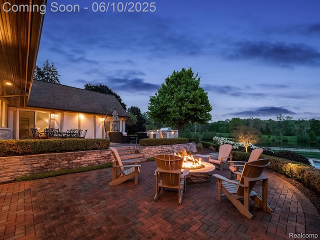 530 E Long Lake Rd, Bloomfield Hills, MI 48304 - view of patio featuring an outdoor fire pit