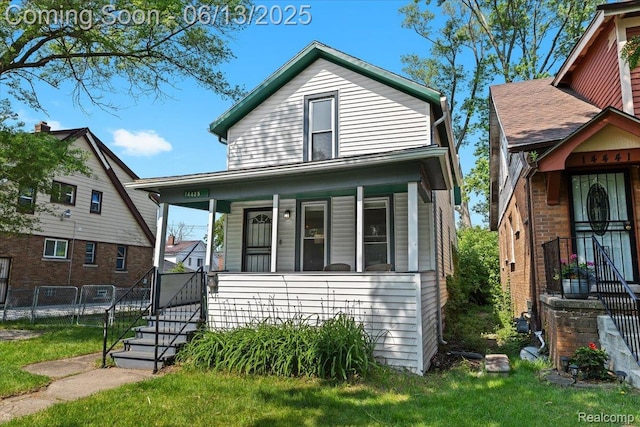 14435 Prevost St, Redford, MI 48227 - view of front of property featuring a gate and a porch