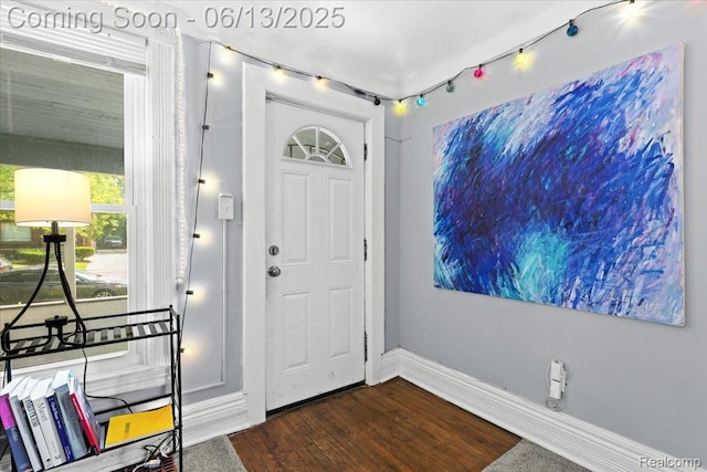 14435 Prevost St, Redford, MI 48227 - entrance foyer with dark wood-type flooring and baseboards