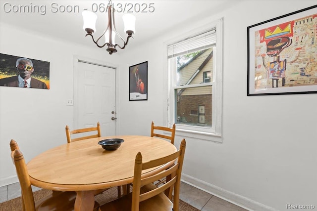14435 Prevost St, Redford, MI 48227 - dining area featuring a chandelier and tile patterned flooring