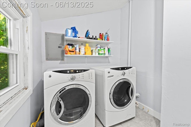 14435 Prevost St, Redford, MI 48227 - laundry area featuring electric panel, washer and clothes dryer, and light tile patterned floors