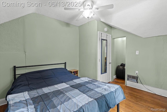 14435 Prevost St, Redford, MI 48227 - bedroom featuring lofted ceiling, a textured ceiling, wood finished floors, and ceiling fan
