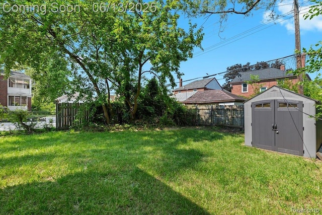 14435 Prevost St, Redford, MI 48227 - fenced backyard featuring a shed