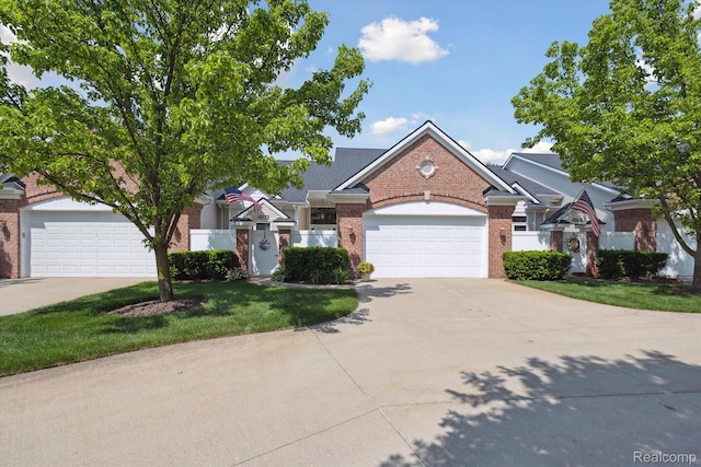 10172 Clarkshire Ct, South Lyon, MI 48178 - traditional home featuring brick siding, driveway, a garage, and a front lawn