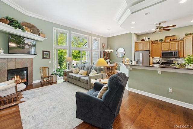 10172 Clarkshire Ct, South Lyon, MI 48178 - living area featuring crown molding, a fireplace, baseboards, recessed lighting, and ceiling fan