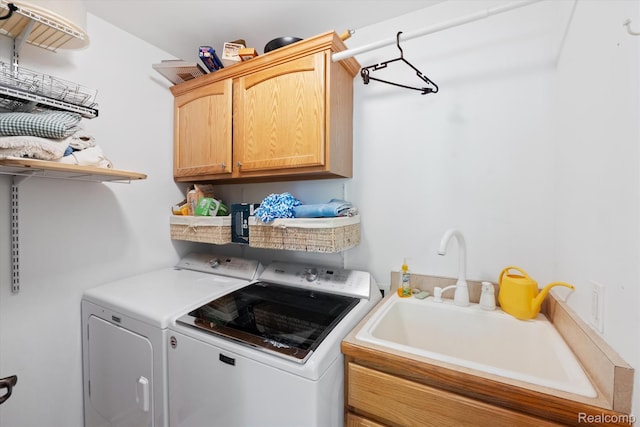 10172 Clarkshire Ct, South Lyon, MI 48178 - laundry area with cabinet space and washing machine and dryer