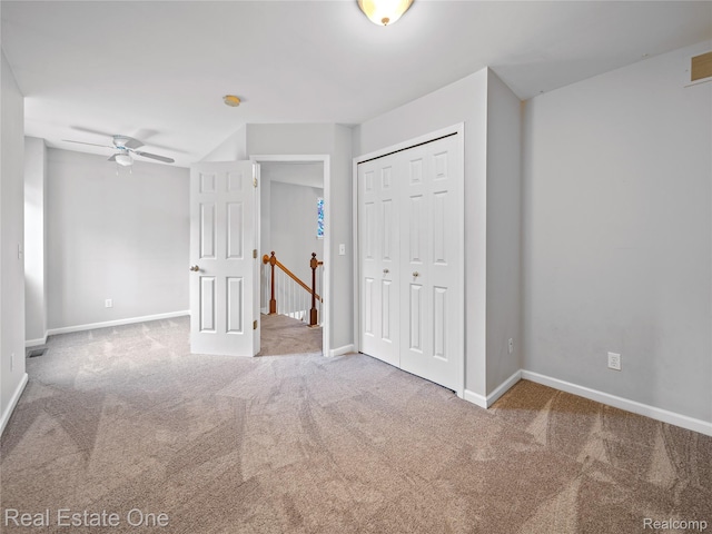 8859 Redstone Dr, Pinckney, MI 48169 - unfurnished bedroom featuring carpet floors, baseboards, and a closet