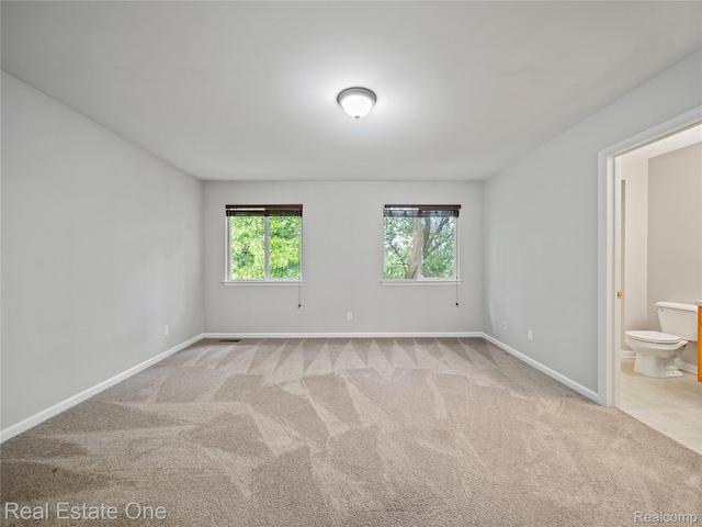 8859 Redstone Dr, Pinckney, MI 48169 - carpeted spare room with plenty of natural light and baseboards