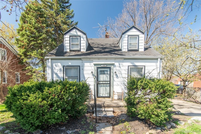 19683 Sunset St, Detroit, MI 48234 - cape cod home with a chimney