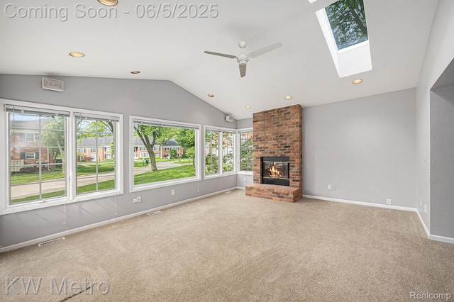 1360 Trailwood Path, Bloomfield Hills, MI 48301 - unfurnished living room featuring healthy amount of natural light, ceiling fan, carpet, a skylight, and vaulted ceiling