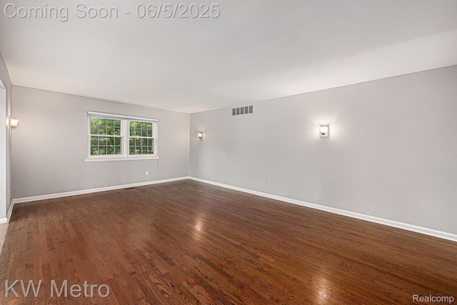 1360 Trailwood Path, Bloomfield Hills, MI 48301 - empty room featuring dark wood finished floors and baseboards