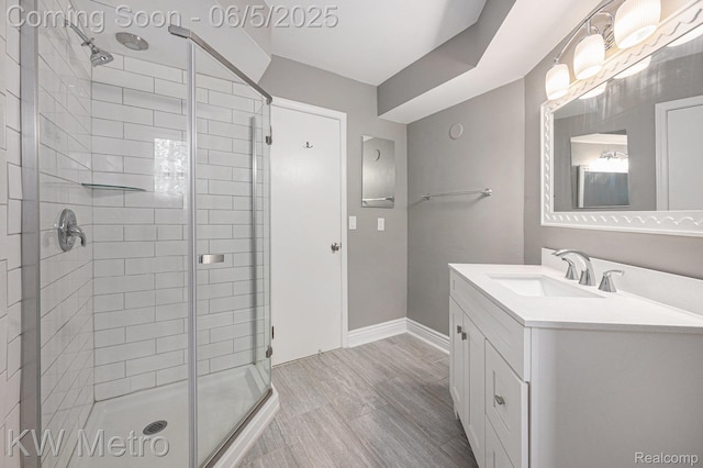 1360 Trailwood Path, Bloomfield Hills, MI 48301 - bathroom with a shower stall, vanity, and baseboards