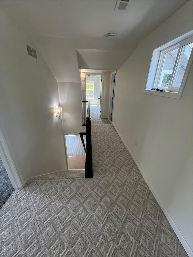 1015 9th St, Port Huron, MI 48060 - hall featuring an upstairs landing, carpet, and lofted ceiling